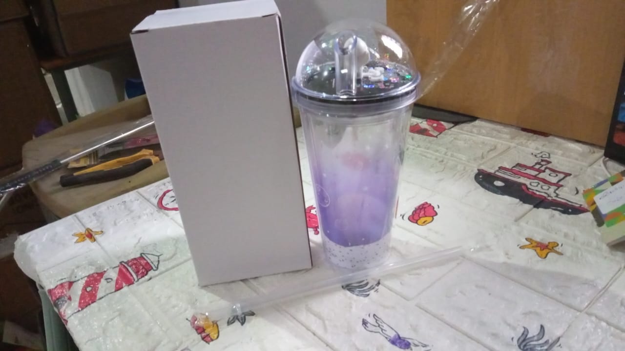Insulated space-themed tumbler with LED light and straw Insulated space-themed tumbler with LED light and straw